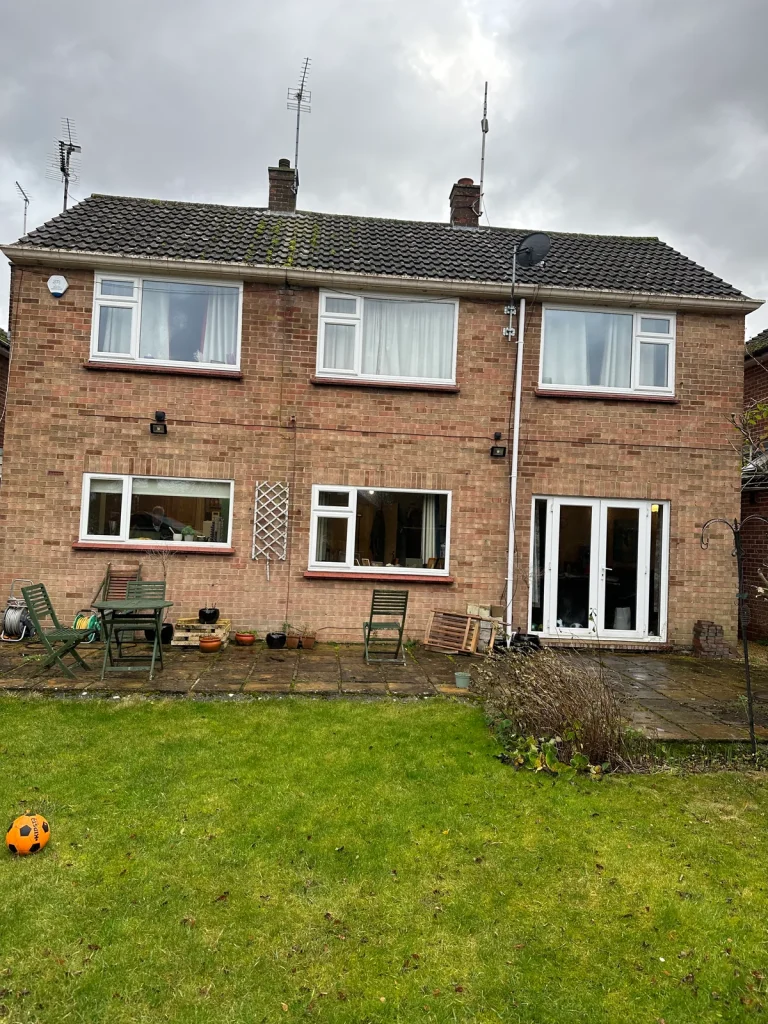 Rear of the original Herons Close house before the extension work began.