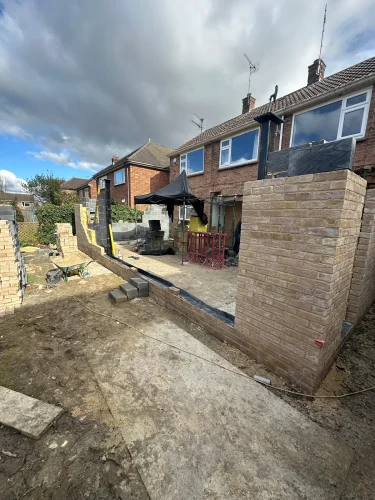 Foundation walls and groundworks taking shape for the large extension.