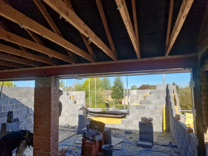 Large open-plan structural opening and upper-floor construction