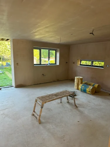 New extension interior after plastering, ready for the final fit-out.