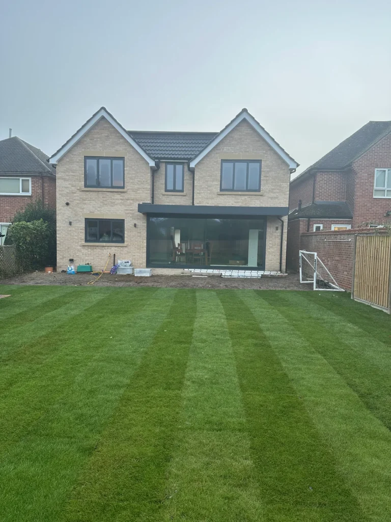 Completed rear elevation of the large Herons Close extension from the garden.